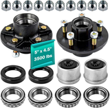 Set of automotive wheel hub components including bearings and spacers on a white background.