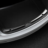 Anti-scratch rear bumper protector for Tesla Model 3, made of stainless steel with carbon fiber texture, providing durable protection and a sleek look.